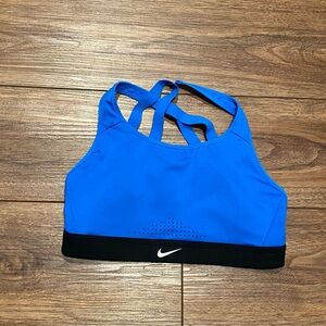 Blue and black Nike sports bra. Like new, worn maybe once size medium